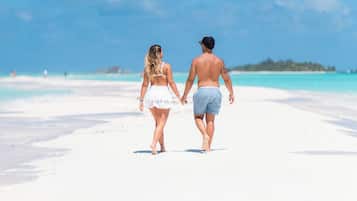 On the beach, white sand, beach shuttle, sun loungers