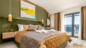 Chambre Deluxe double, balcon, vue sur la mer | Coffre-fort, rideaux d’obscurcissement
