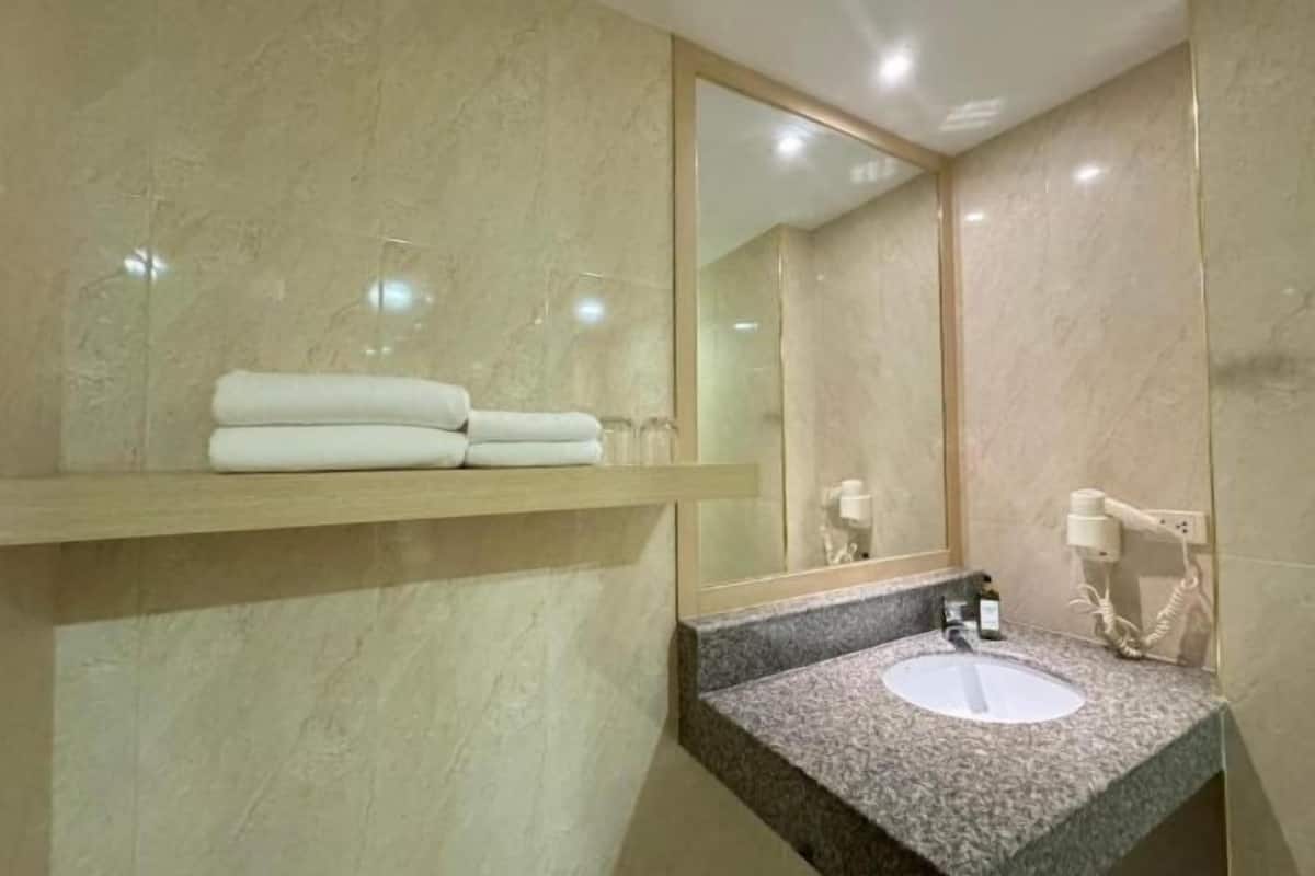 Bathroom | Shower, free toiletries, hair dryer, towels