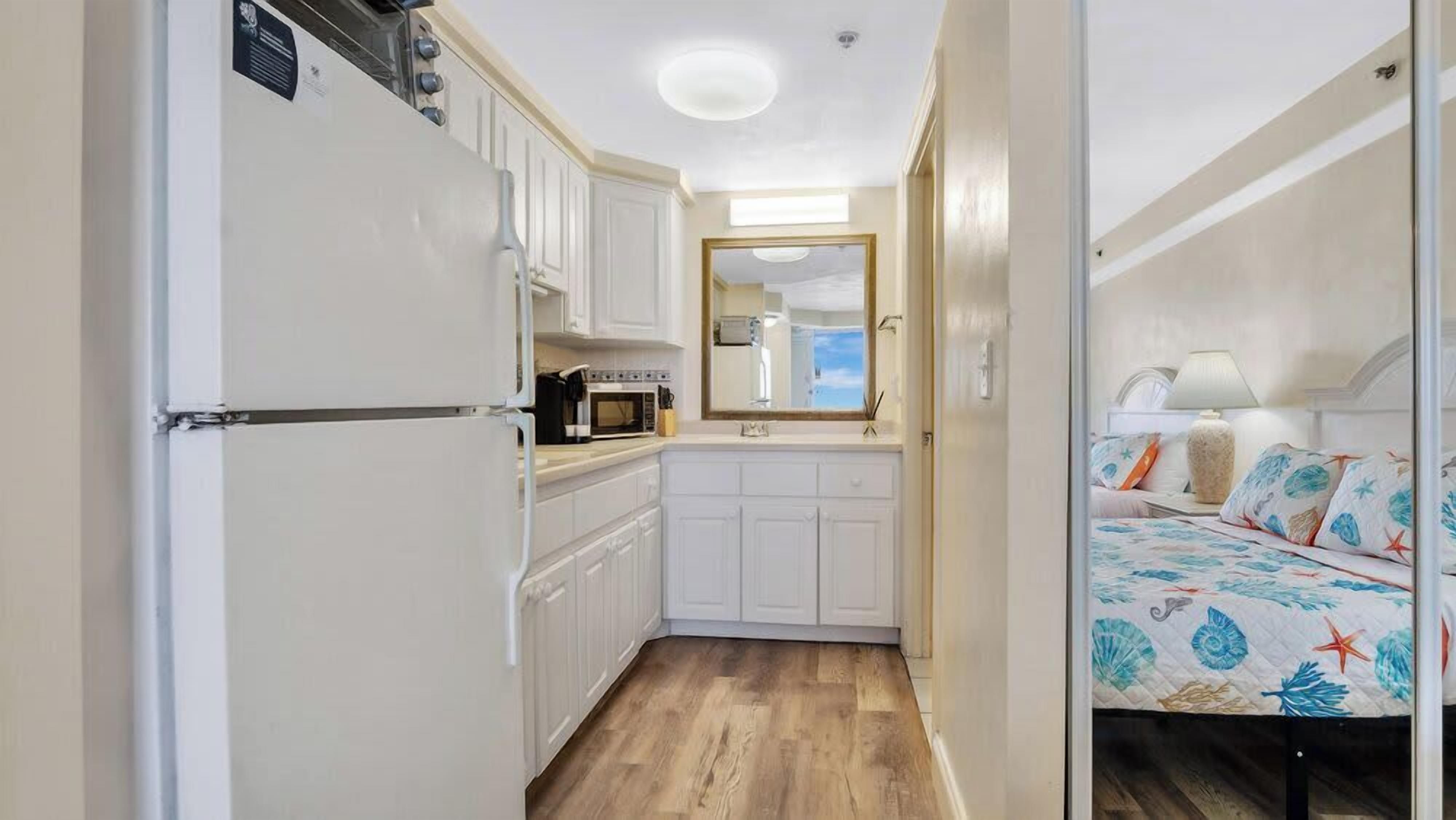 Fridge, microwave, stovetop, coffee/tea maker