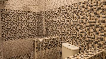 Shower, free toiletries, hair dryer, slippers