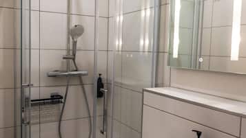 Shower, towels, toilet paper