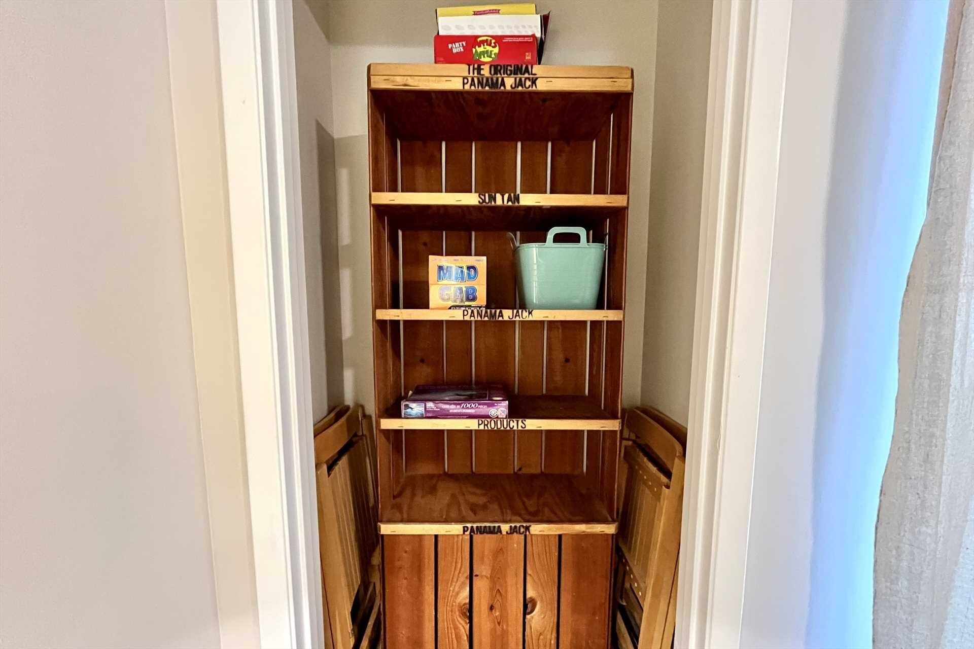 A wooden shelf unit with labeled sections for 'SUNYAN' and 'PRODUCTS'.