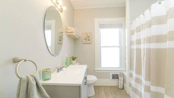 Hair dryer, towels, soap, shampoo