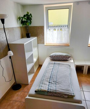4 bedrooms, desk, iron/ironing board, travel cot