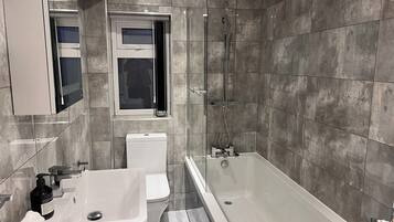 Hair dryer, towels, soap, toilet paper