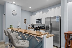 Fridge, microwave, oven, stovetop - Family-Friendly 5BD/4BA Townhome with Grill & Pool (Kissimmee)