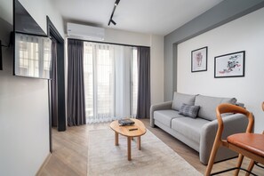 42-inch Smart TV with digital channels, streaming services