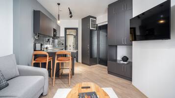 42-inch Smart TV with digital channels, streaming services