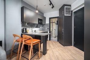 Standard Apartment | Private kitchen | Fridge, microwave, stovetop, dishwasher