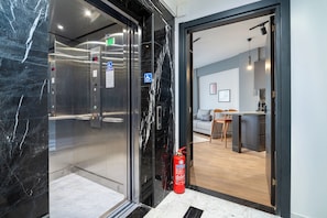 Elevator offers convenient access to floors.