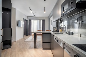 Enjoy cooking in this well-equipped kitchen with a dishwasher and large island.