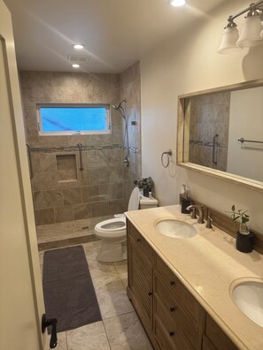 Shower, bidet, towels, soap