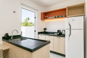 Fridge, microwave, stovetop, cookware/dishes/utensils