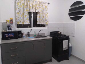 Fridge, microwave, oven, coffee/tea maker