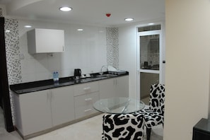 Deluxe Apartment | In-room safe, desk, laptop workspace, iron/ironing board - Pioneer Hotel Apartments (Muscat)