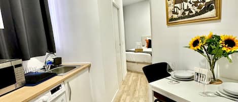 Apartment, 1 Bedroom | Living area | TV