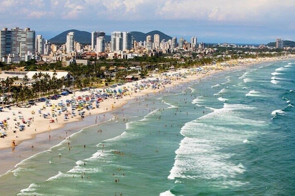 On the beach, white sand, beach umbrellas, beach bar