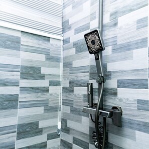 Shower, towels, soap, toilet paper