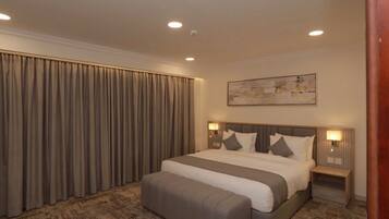 Suite Familiale | Literie hypoallergénique, espace de travail pour ordinateur portable