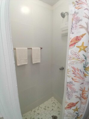 Shower, towels, soap, toilet paper - Cozy Nook Studio apartment in Perfect Getaway Tarpum Bay with AC, WiFi & kitchen (Tarpum Bay)