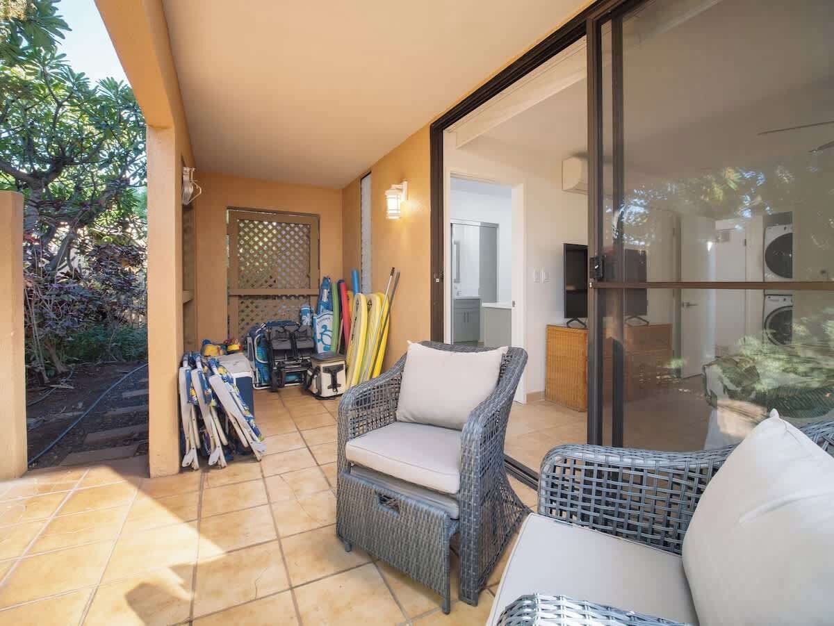 Lanai off the Main Bedroom.  All beach toys, chairs, umbrellas in the background.