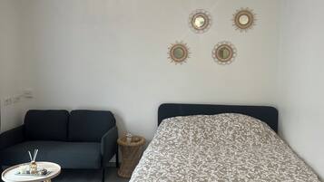 1 dormitori i roba de llit