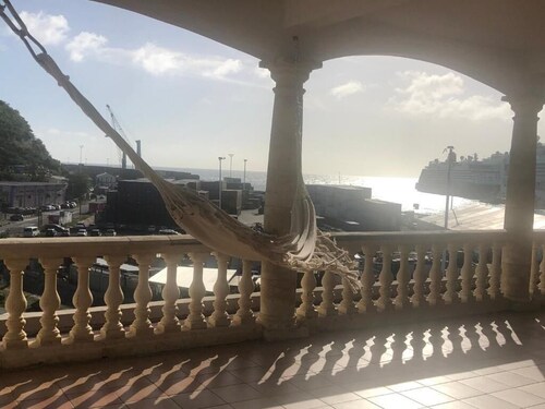 Cozy 2-bedroom apartment, large breezy balcony, view of the  cruise terminal.