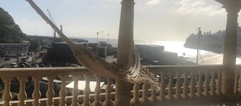 Cozy 2-bedroom apartment, large breezy balcony, view of the  cruise terminal.