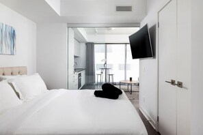 1 bedroom, desk, iron/ironing board, travel cot