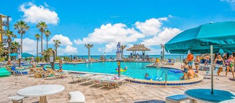 Oceanfront condo with private balcony , kitchenette, beach access and pool