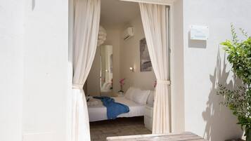 1 bedroom, desk, iron/ironing board, travel crib