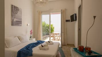 1 bedroom, desk, iron/ironing board, travel crib