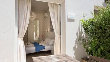 1 bedroom, desk, iron/ironing board, travel crib