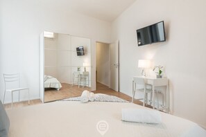 1 habitación, tabla de planchar con plancha, wifi y ropa de cama 