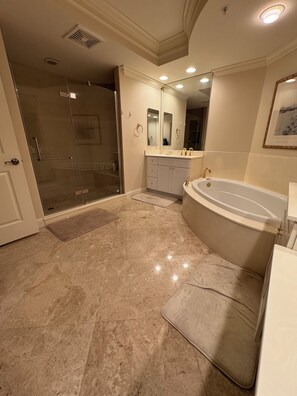 Jetted tub, hair dryer, towels, soap