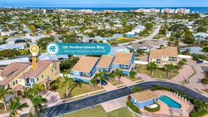 Vista aérea de una zona residencial con una casa señalada en el número 136 de Mediterranean Way.