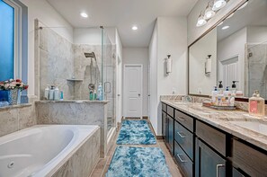 Shower, jetted tub, hair dryer, bidet
