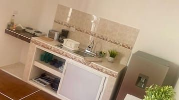 Microwave, stovetop, coffee/tea maker, toaster