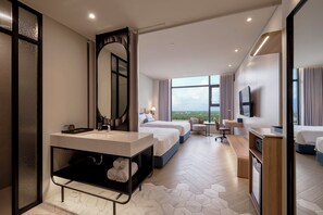 Deluxe Twin Room, 2 Double Beds | Free minibar, in-room safe, desk, laptop workspace