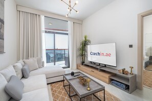 Deluxe-Apartment, Balkon | Wohnbereich