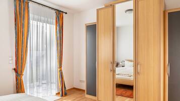 2 dormitorios, tabla de planchar con plancha, wifi gratis y ropa de cama