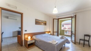 1 bedroom, travel crib, WiFi (free), bed sheets - Nice apartment for 4 guests with A/C, pool, WIFI and TV (Villasimius)