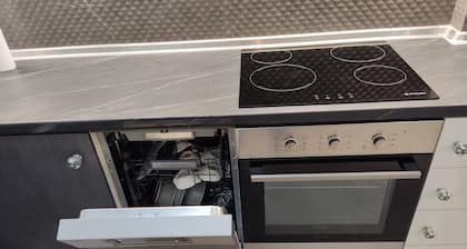 "Comfort Cave: Modern Living Near Metro & Thessaloniki Center!"