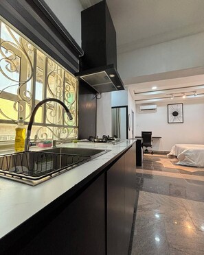 Family Apartment, Balcony, City View | Private kitchen | Fridge, microwave, oven, stovetop - Yokolo Luxury Apartment (Abuja)