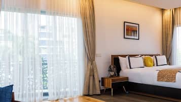 Deluxe Room, Balcony, City View | Desk, laptop workspace, free WiFi