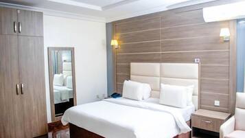 Deluxe Room, Balcony, City View | Desk, laptop workspace, free WiFi