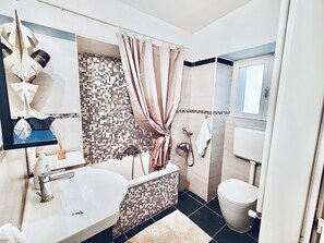Hair dryer, towels, soap, toilet paper