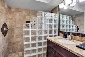 Shower, hair dryer, towels