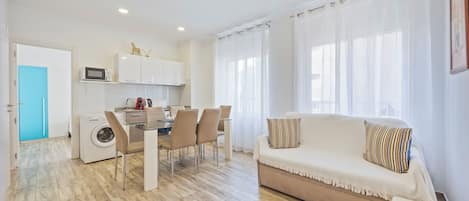 Standard Apartment, 2 Bedrooms, City View | Living area | Flat-screen TV